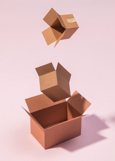 Boxes arrangement on pink background