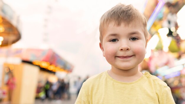 Boy in amusement park