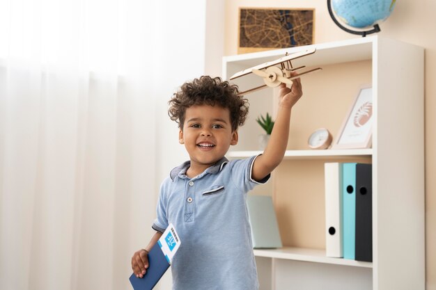 Boy awaiting trip planning from his traveling agent