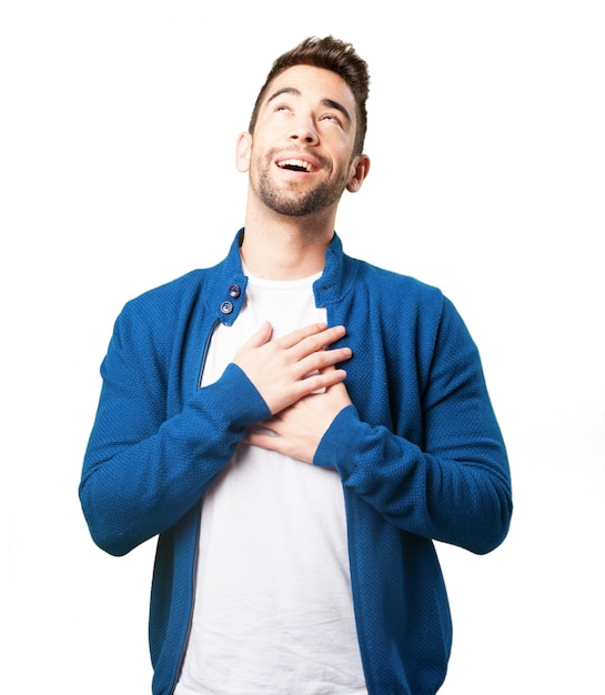 Boy in a blue jacket laughing