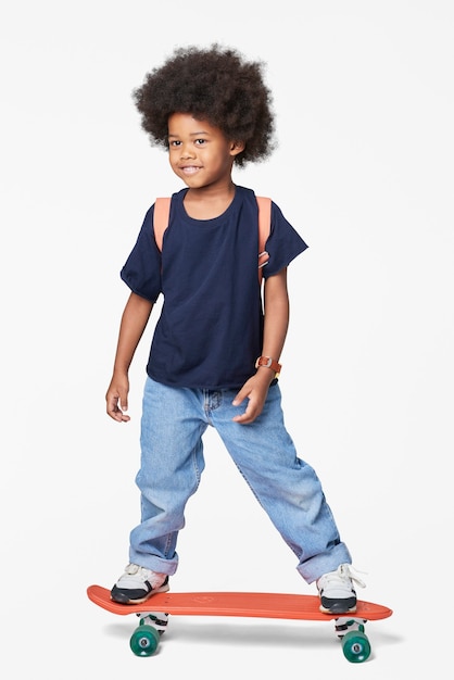 Boy in casual wear on a skateboard