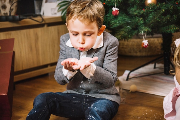 Free photo boy celebrating christmas