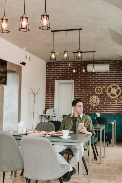 Boy eating in a restaurant