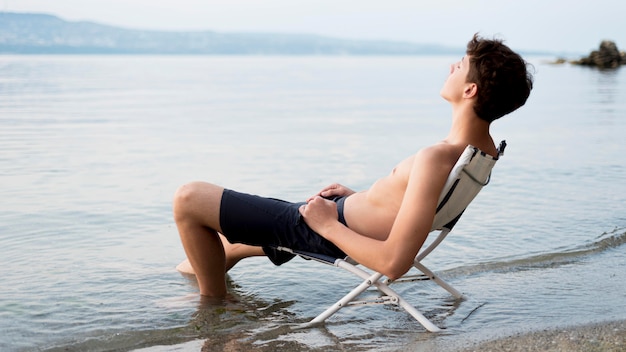 Boy enjoying nature time in water