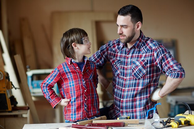 Boy and father talking