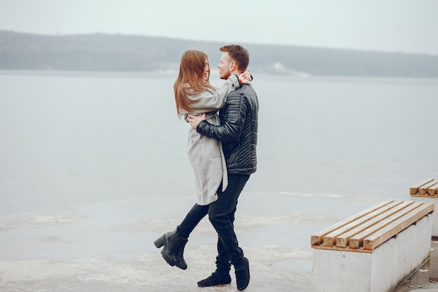 Free photo boy and girl in the park. loving couple walking. couple relaxes.