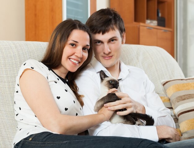 Boy and girl on sofa