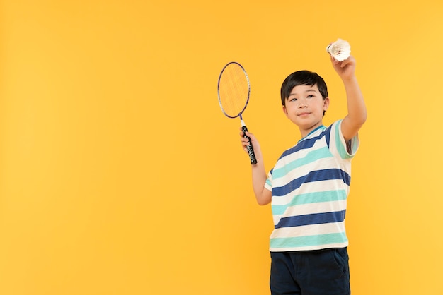 Boy having fun in a summer setting studio