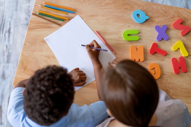 Boy having an occupational therapy session with a psychologist