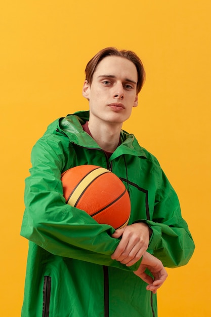 Boy holding basketball ball