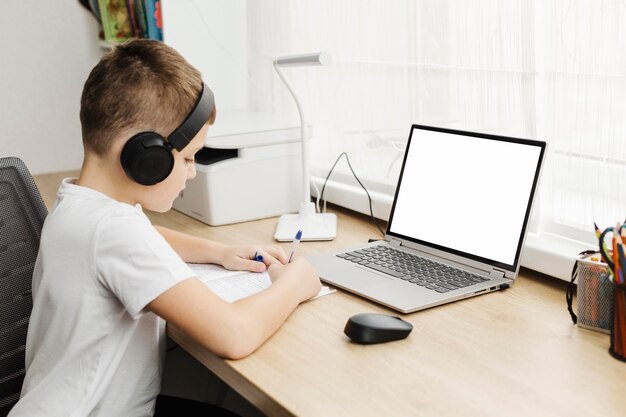 Boy a home attending online classes