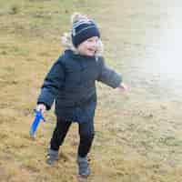 Free photo boy playing outside