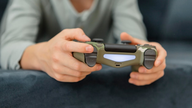 Boy playing with a controller