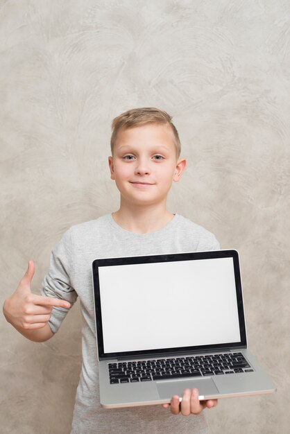 Boy presenting laptop template