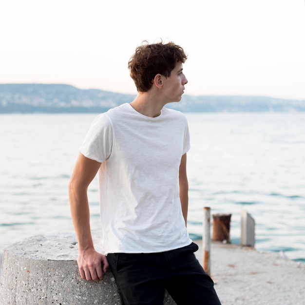 Boy relaxing and spending time at sea