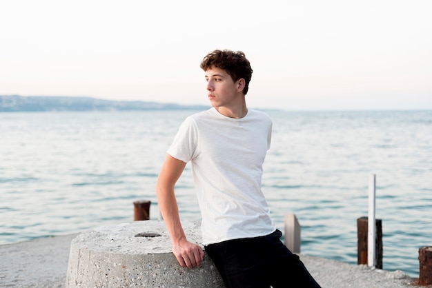 Boy relaxing and spending time at sea