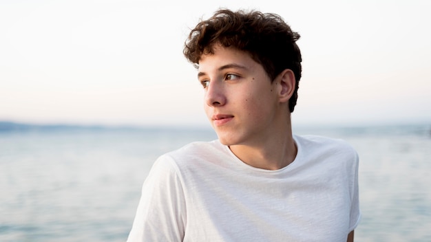 Boy relaxing and spending time at sea