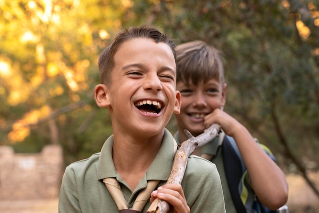 Boy scout members having fun in nature