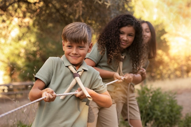 Boy scout members having fun in nature