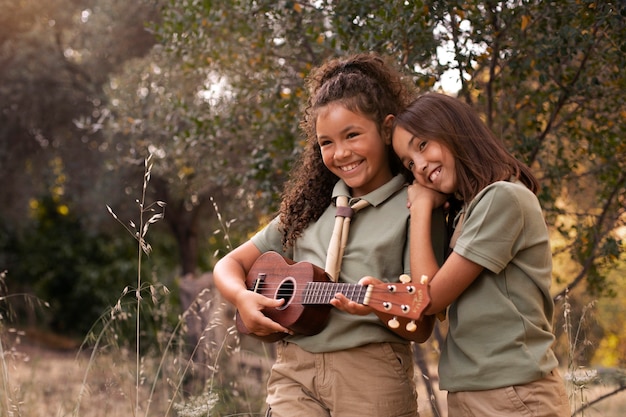 Free photo boy scout members having fun in nature