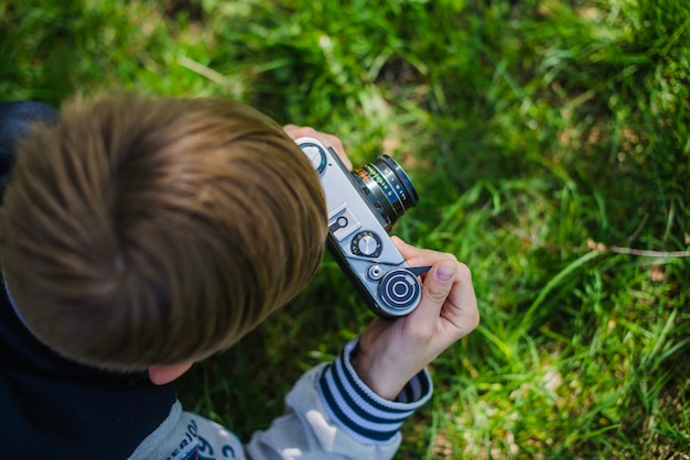 Boy using his camera