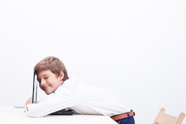 Boy using his laptop computer