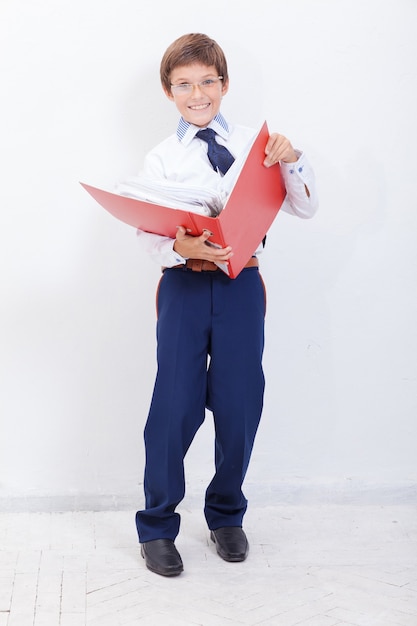 The boy with folders