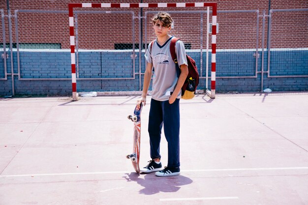 Free photo boy with skateboard