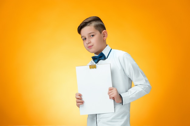 boy with tablet for notes