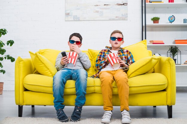 Boys on couch with 3d glasses