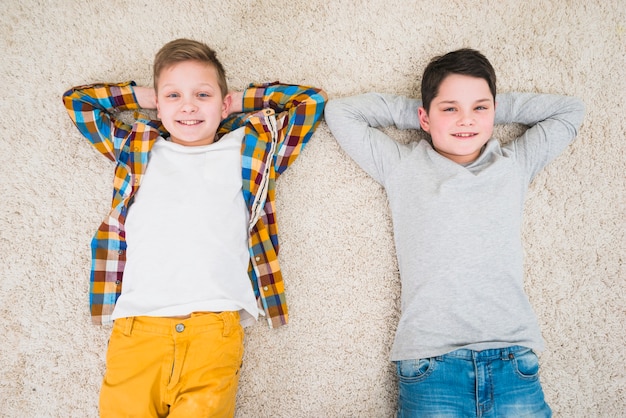 Boys relaxing on floor