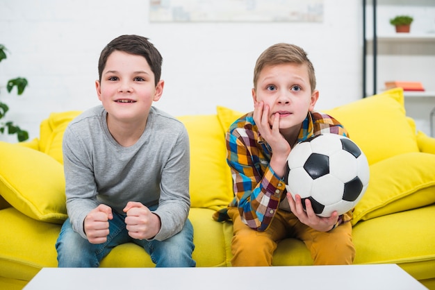 Free photo boys with soccer ball