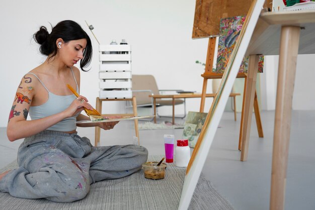 Braless woman working indoor