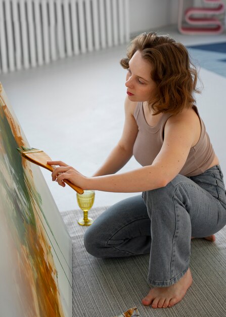 Braless woman working indoor