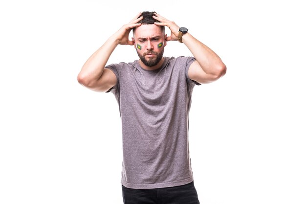 Brazil lose. Unhappy and Failure of goal or lose game emotions of Brazil football fan in game supporting of Brazil national team on white background. Football fans concept.