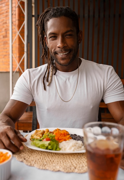 Free photo brazilian family enjoying meal together