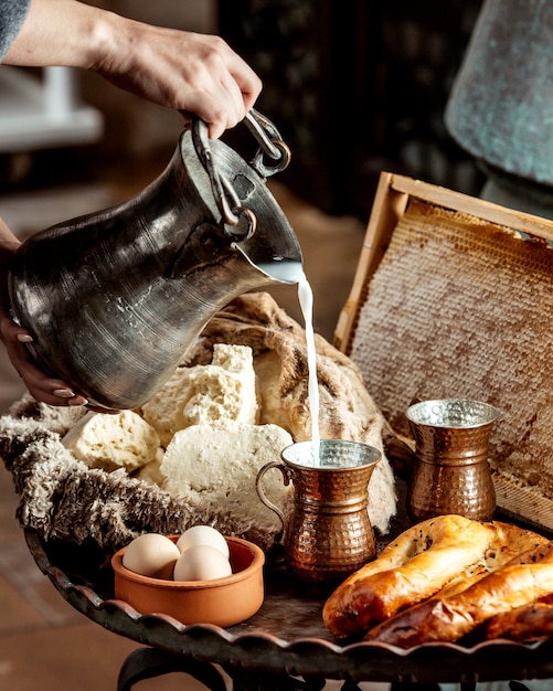 Bread and bagels with eggs and milk