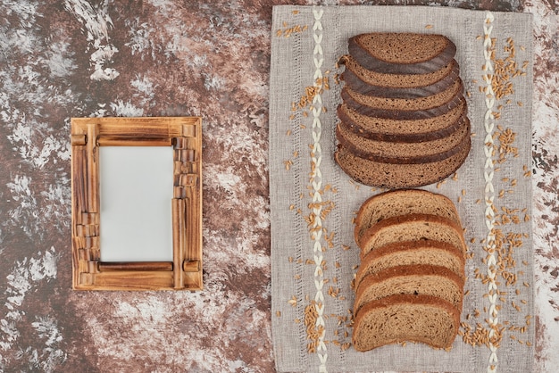 Free photo bread buns with wheat grains.