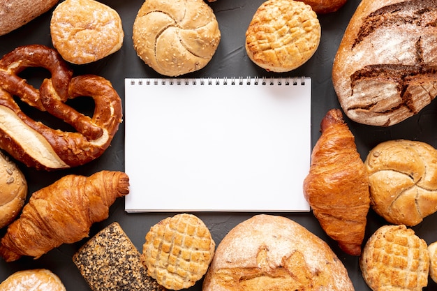 Bread croissants and a notebook