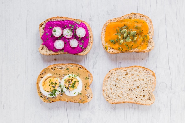 Bread near open sandwiches