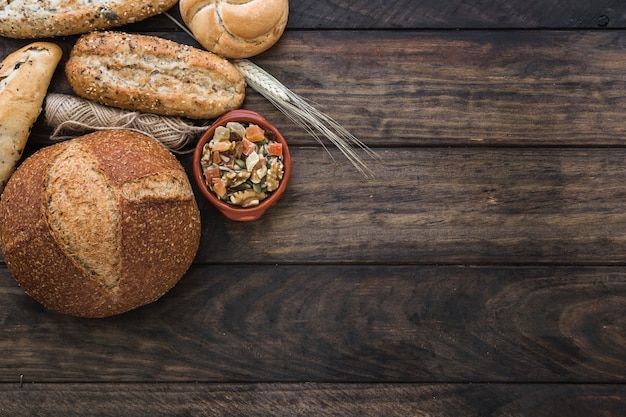 Free photo bread near rope and nuts