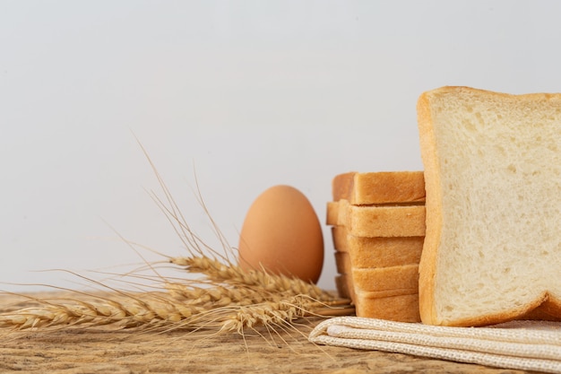 Bread on a wooden table on an old wooden floor.