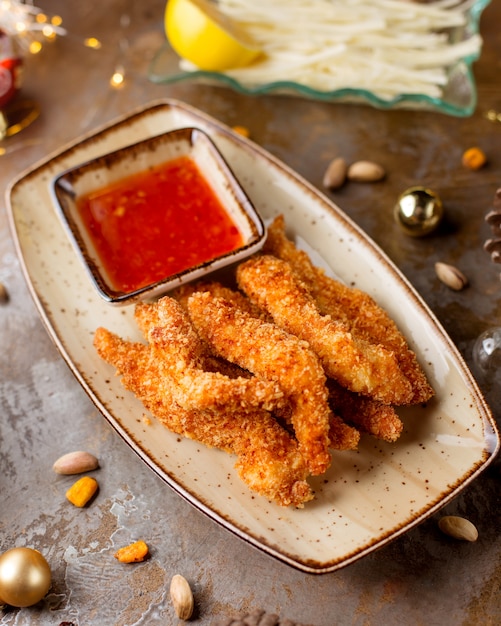 Free photo breaded shrimps served with sauce