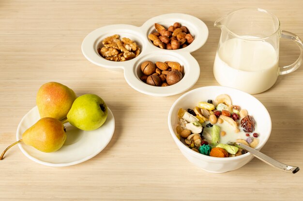 Breakfast arrangement on plain background