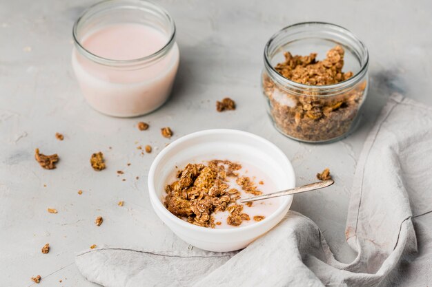 breakfast bowl with granola and milk