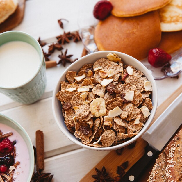 Breakfast decoration with cereals and milk