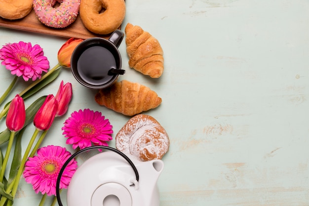 Breakfast flat lay with flowers