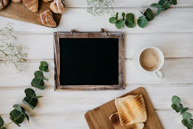 Breakfast, leaves and blackboard