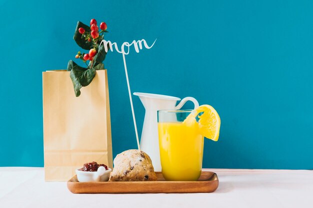 Breakfast and mothers day concept with shopping bag