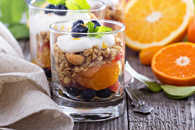 Breakfast parfait with oranges granola yogurt